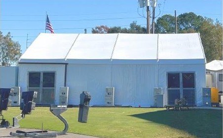 Climate-controlled skid and tent kitchen on site