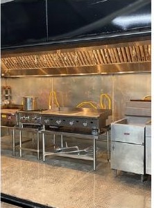 Commercial cooking line inside a temporary kitchen